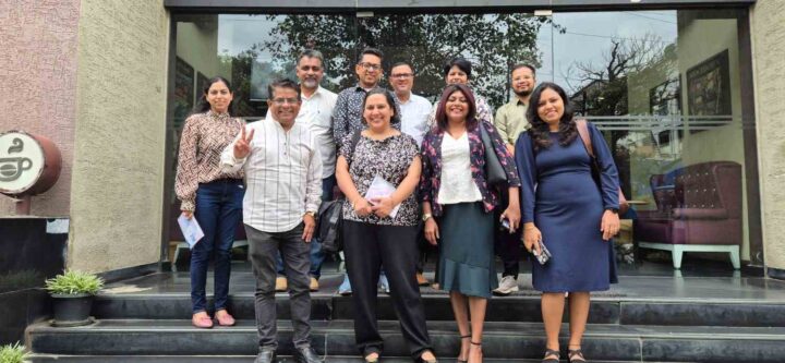 Team photo after a business meeting outside the office