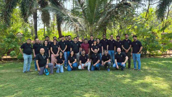 Company team group photo during an outdoor team-building event