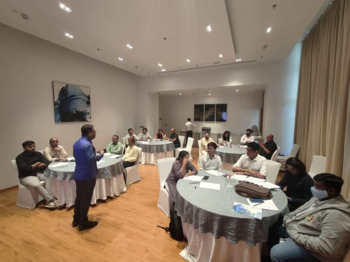 DimenZion3 facilitator leading a collaborative leadership workshop