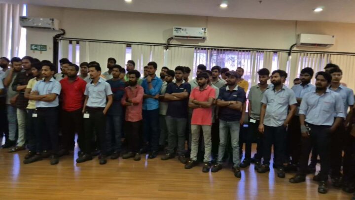 Employees listening during a workplace engagement and organizational development session conducted by DimenZion3.