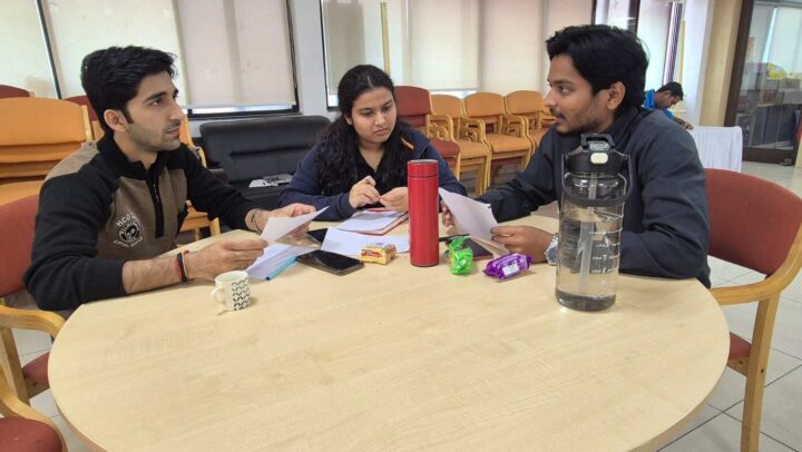 Employees discussing ideas during a small group workshop