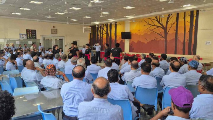 Employees attending a workplace team engagement learning session facilitated by DimenZion3.